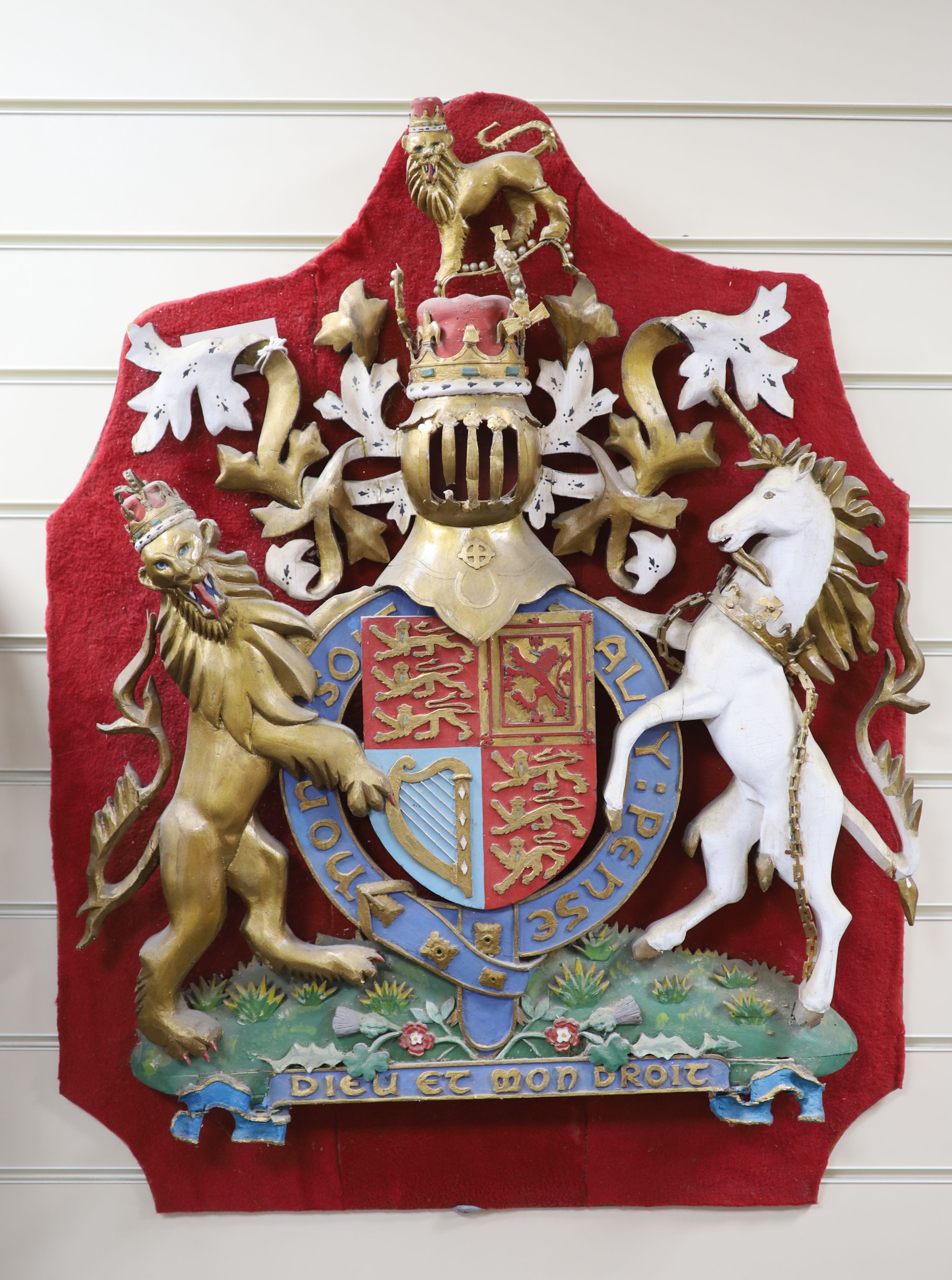 A carved wood and polychrome painted Royal armorial crest, overall length 84cm